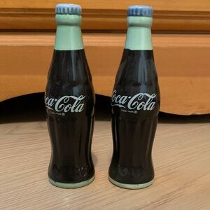 Coca Cola Black and Green Ceramic Bottles